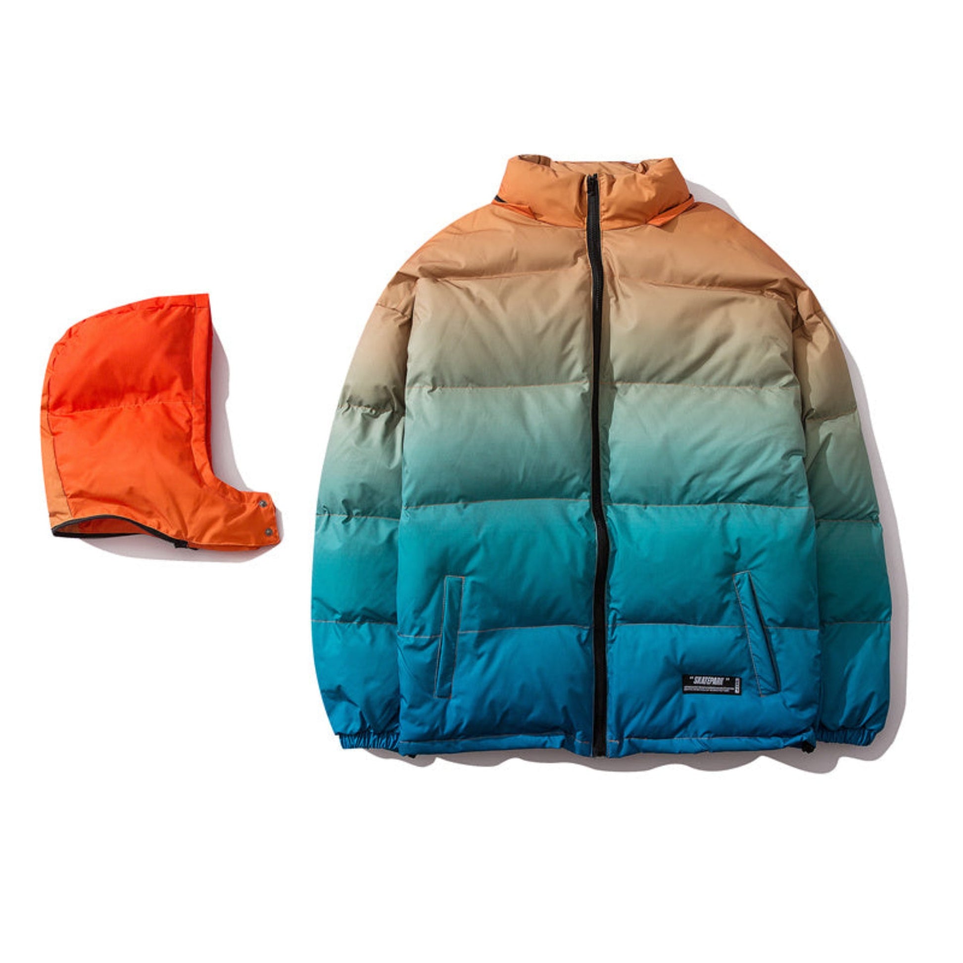 Flat lay of orange to blue gradient winter coat with detachable hood displayed separately