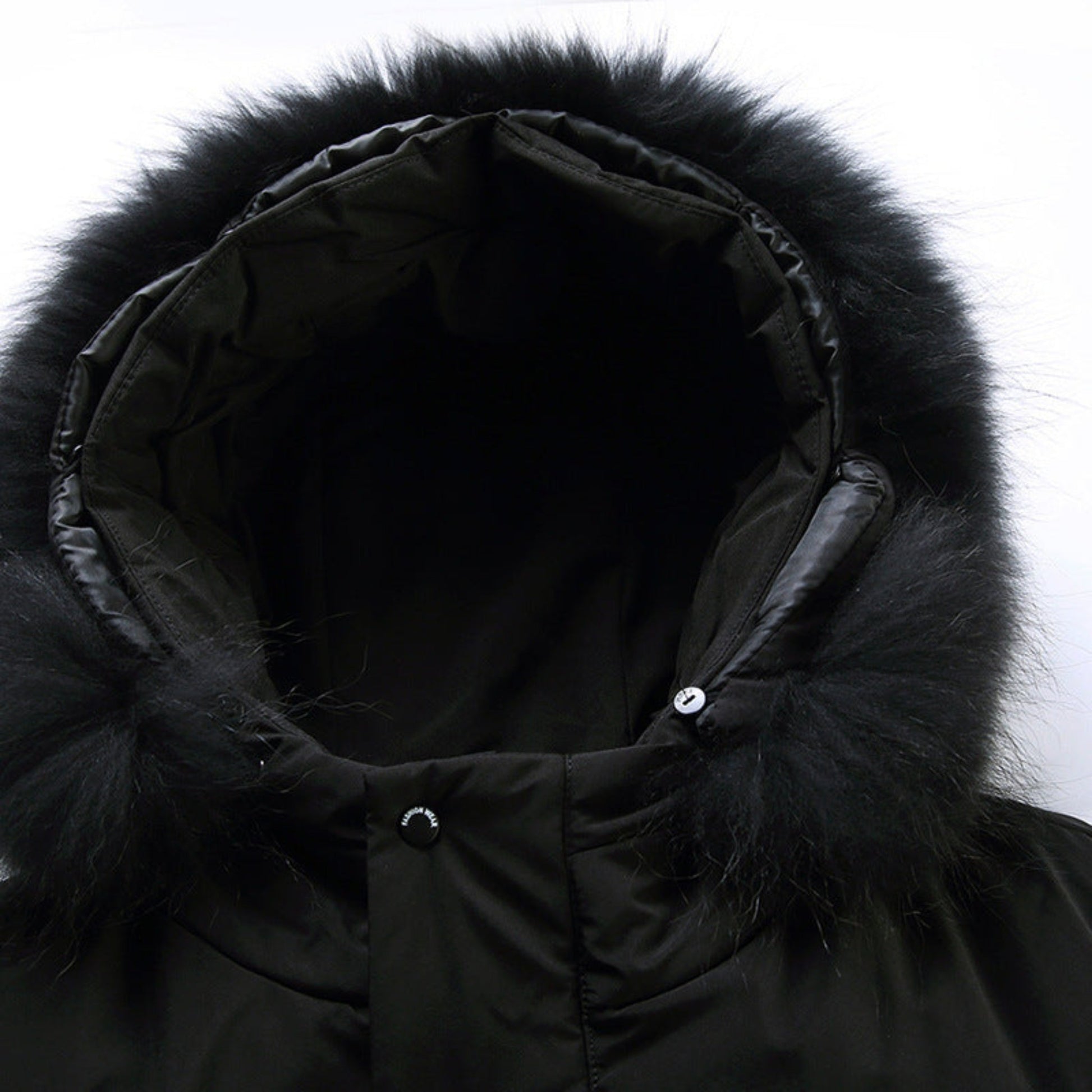 Close-up of the hood with faux fur lining, emphasizing its texture and premium material.