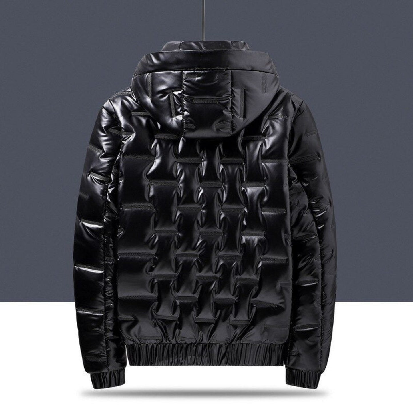 Black hooded jacket displayed on a hanger, back view, showcasing a shiny geometric pattern.