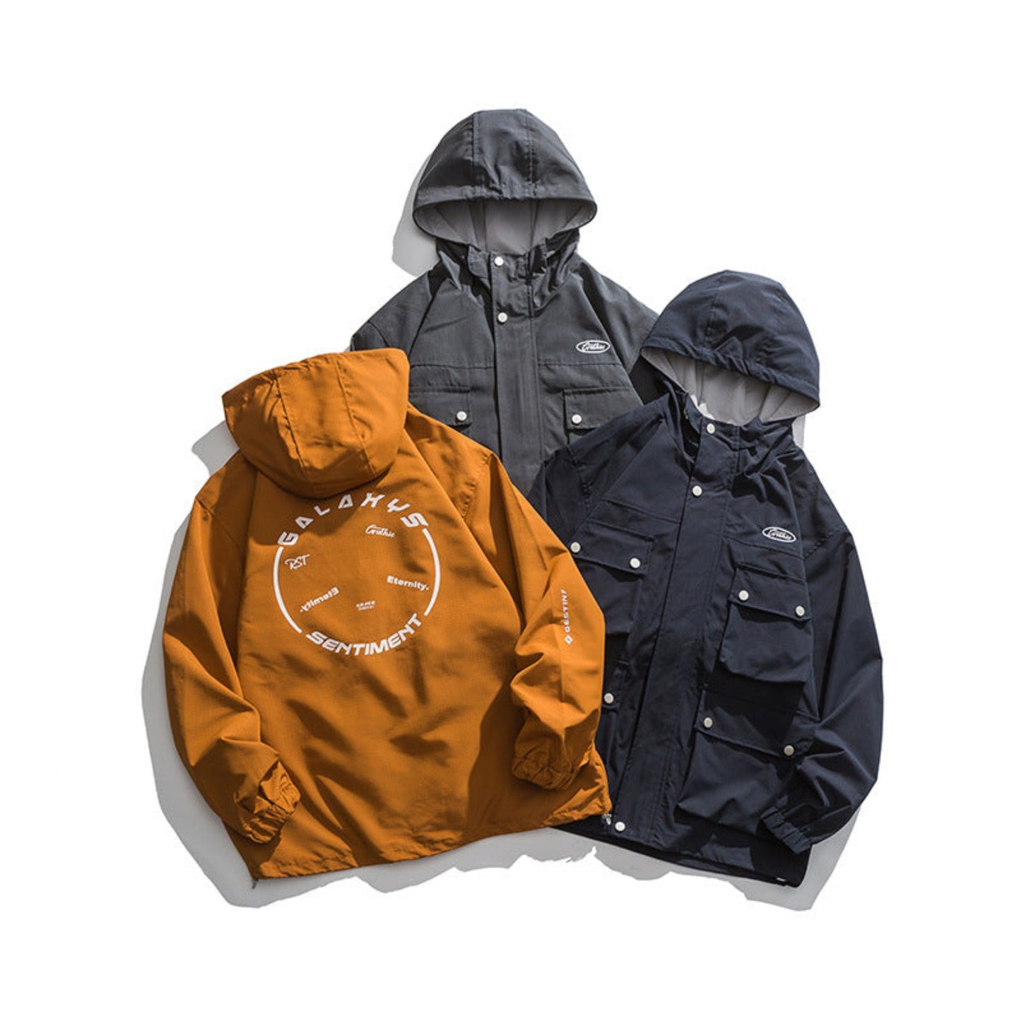 Japanese Tooling-Style Outdoor Jackets in Navy Blue, Dark Gray, and Orange, front view