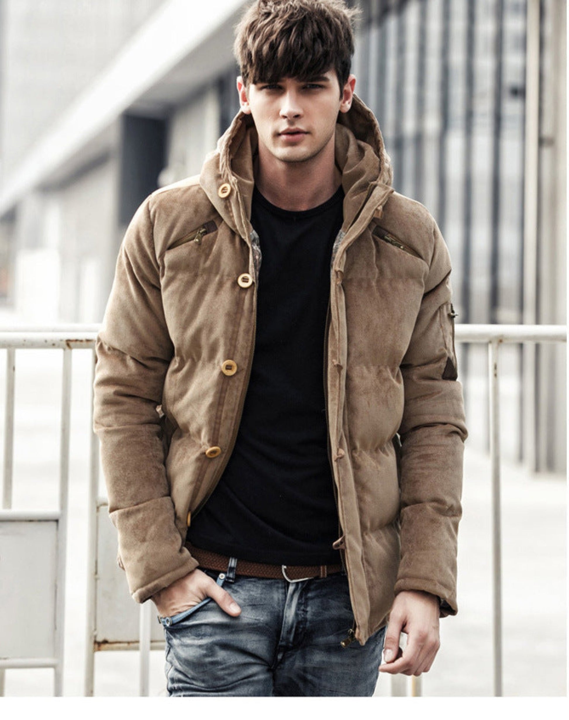 Front view of the khaki hooded corduroy jacket worn by a model.