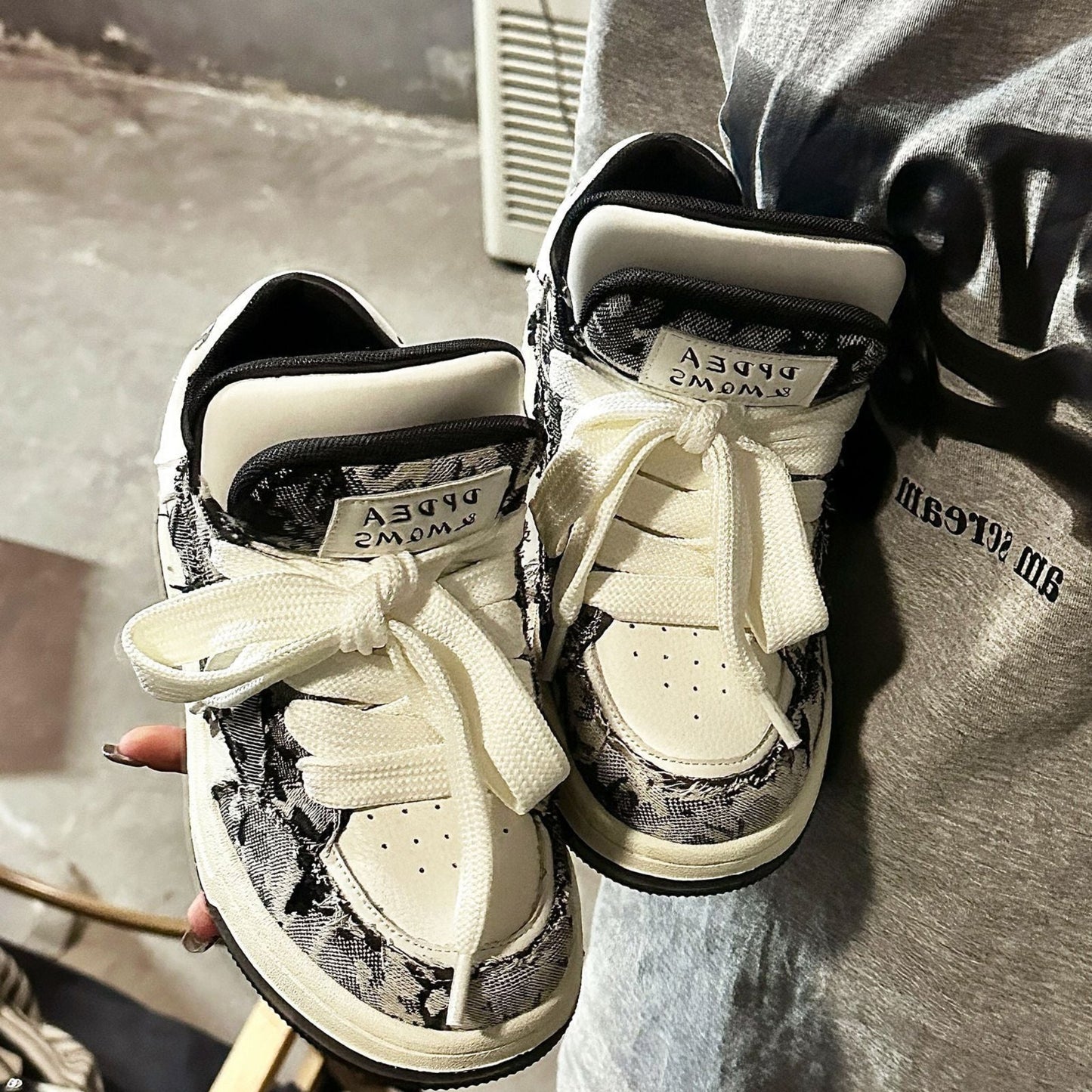 Canvas sneakers with damaged design in multiple patterns