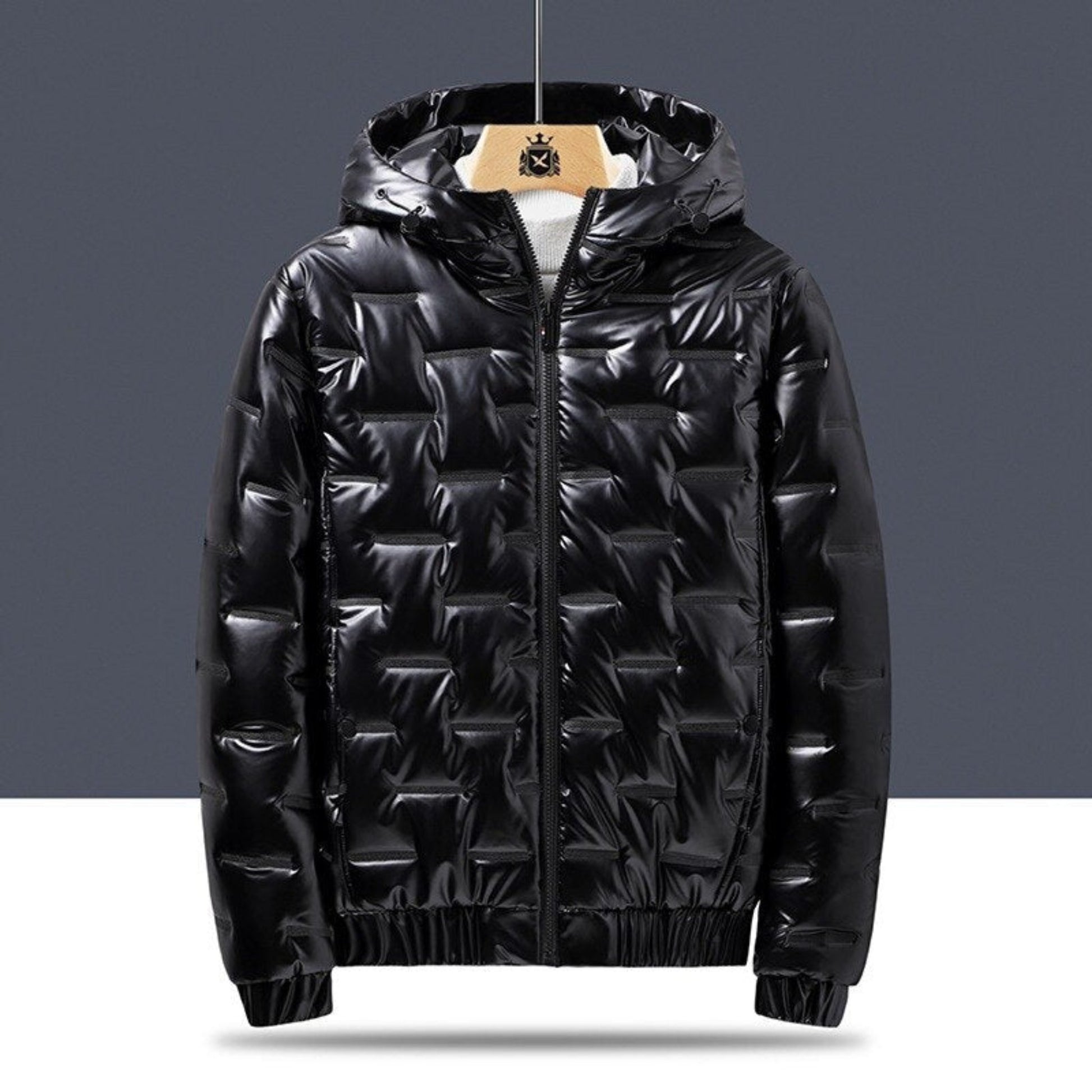 Black hooded jacket on a hanger, front view, showing a sleek geometric texture."