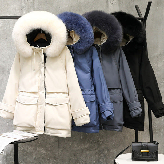 Front view of four women’s winter jackets in white, blue, light blue, and black, with detachable fur collars displayed on a rack